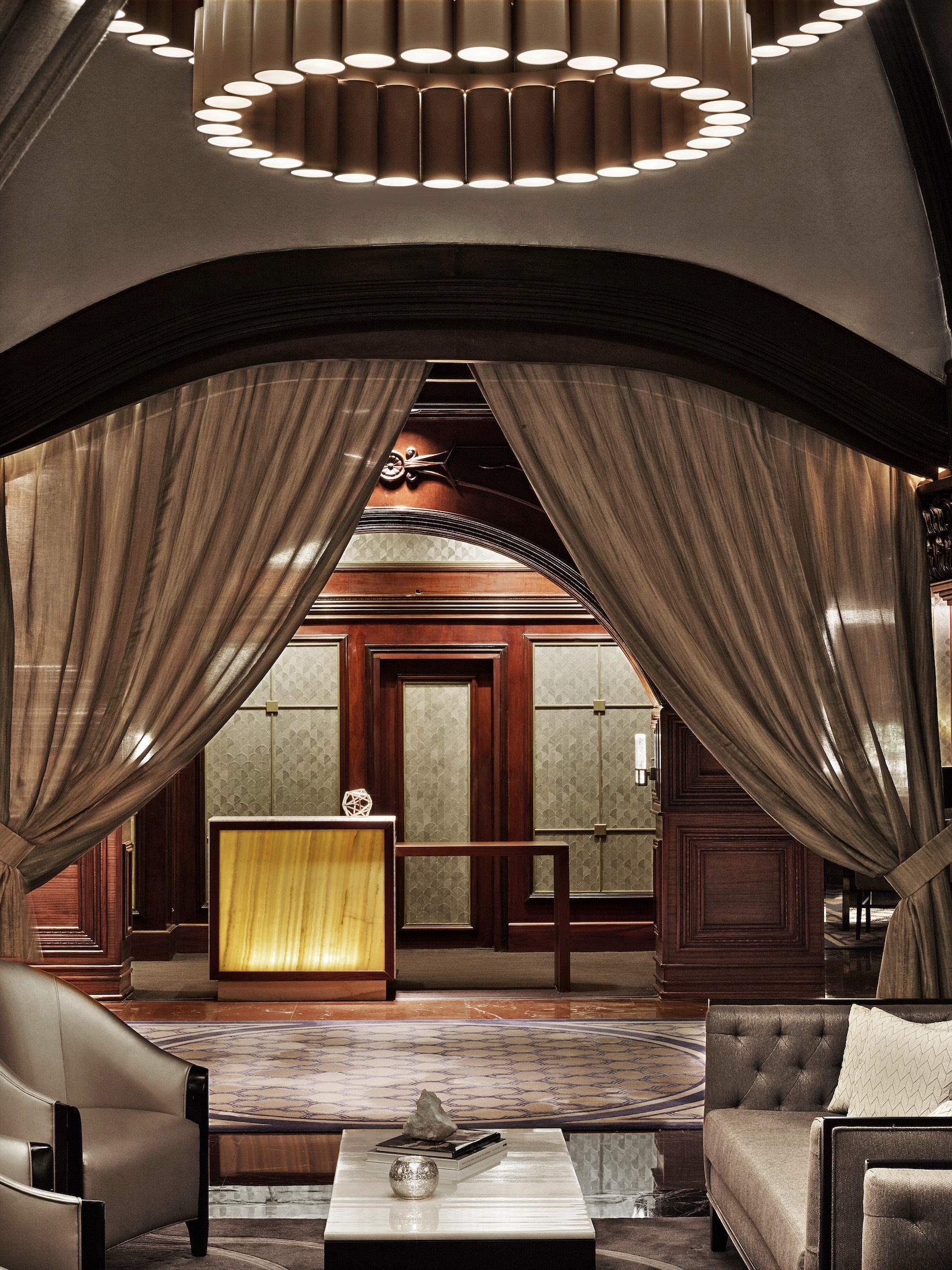 lounge area with cushioned sofas