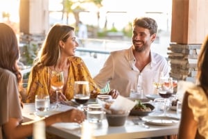 couple looking at each other while dining