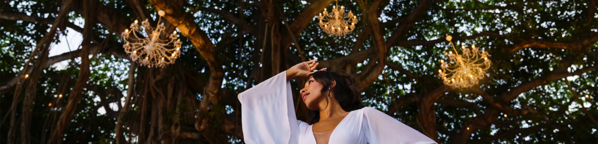 woman in front of the banyan tree