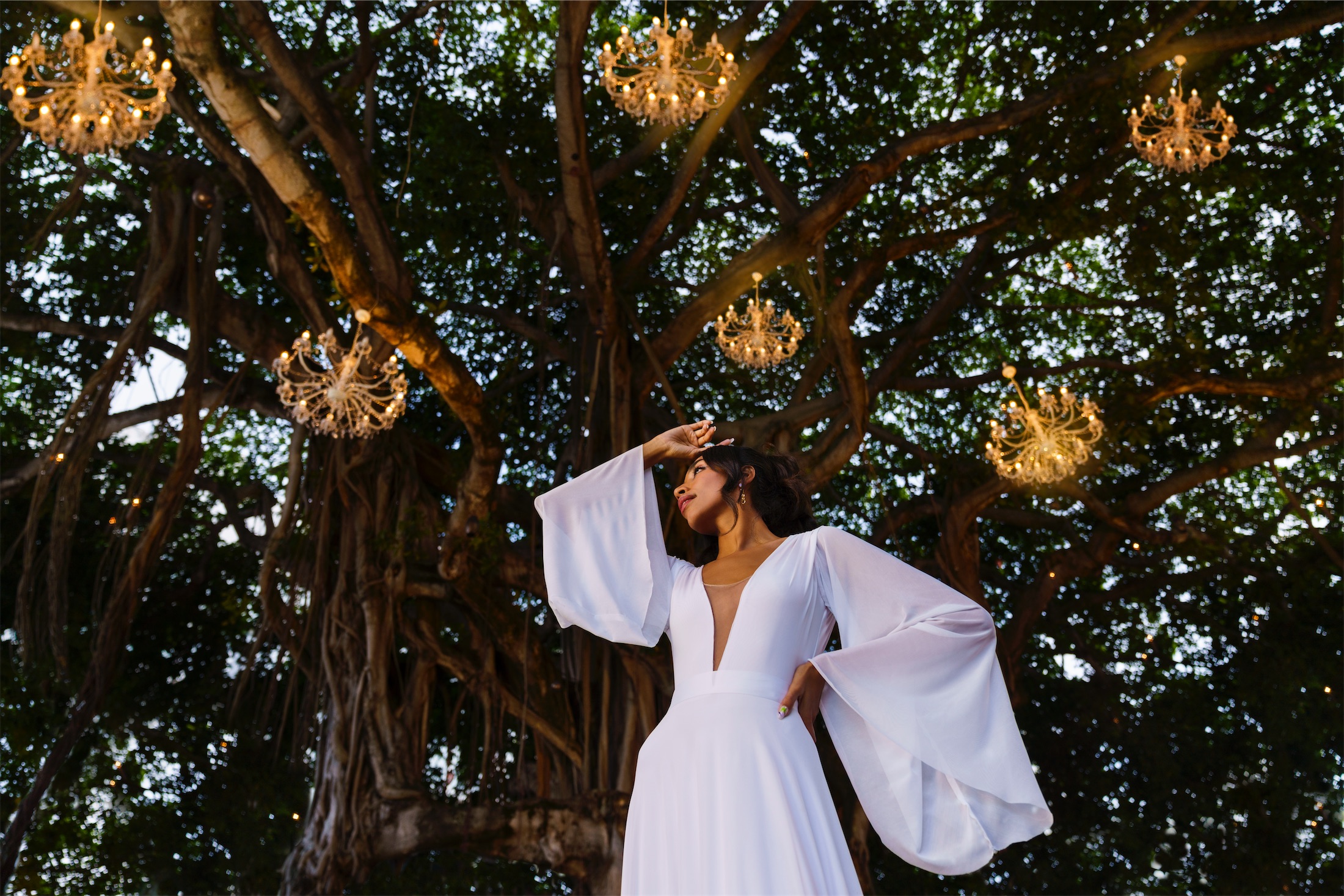 woman in front of the banyan tree