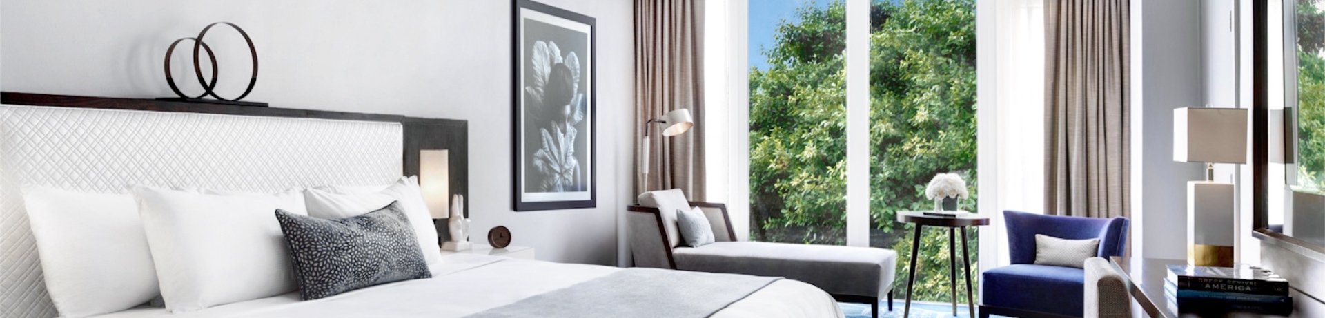 bedroom with a king bed and view of trees