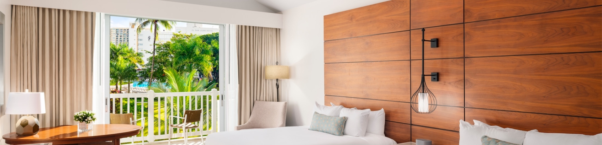 hotel room with 2 queen sized beds and balcony