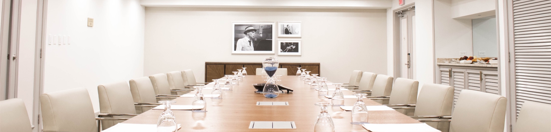 large meeting table with cushioned seating