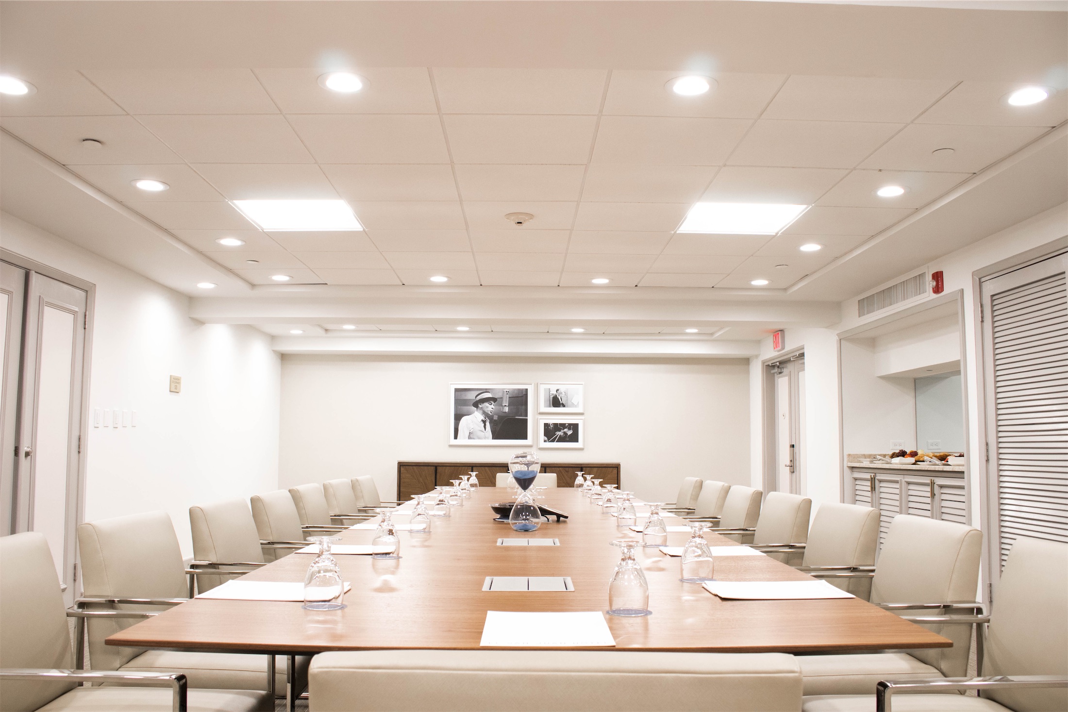 large meeting table with cushioned seating