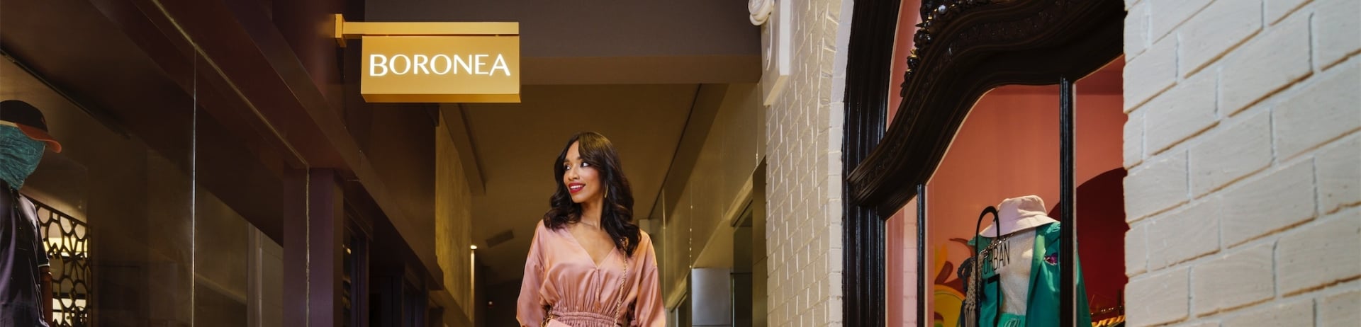 woman walking beside a store