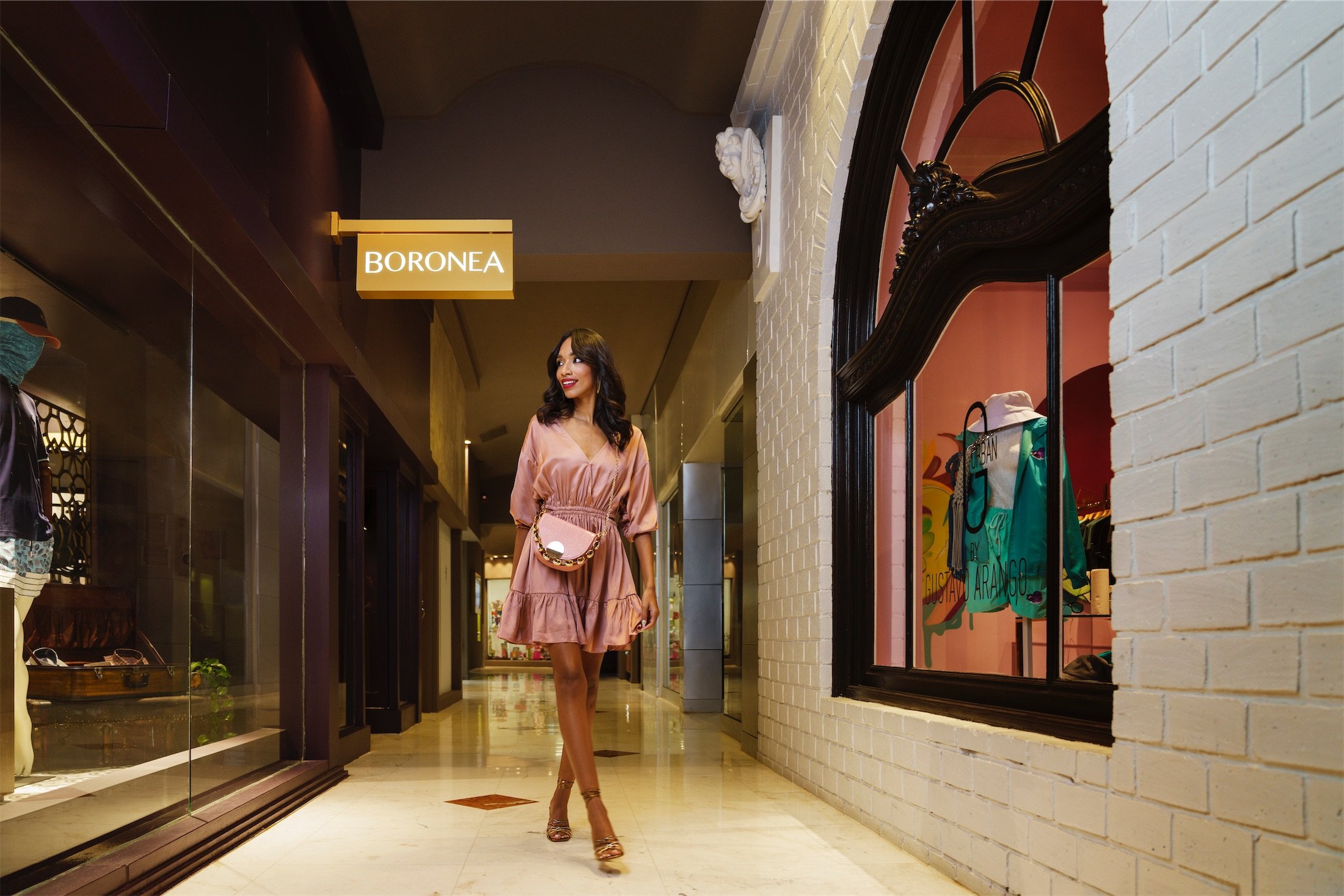 woman walking beside a store