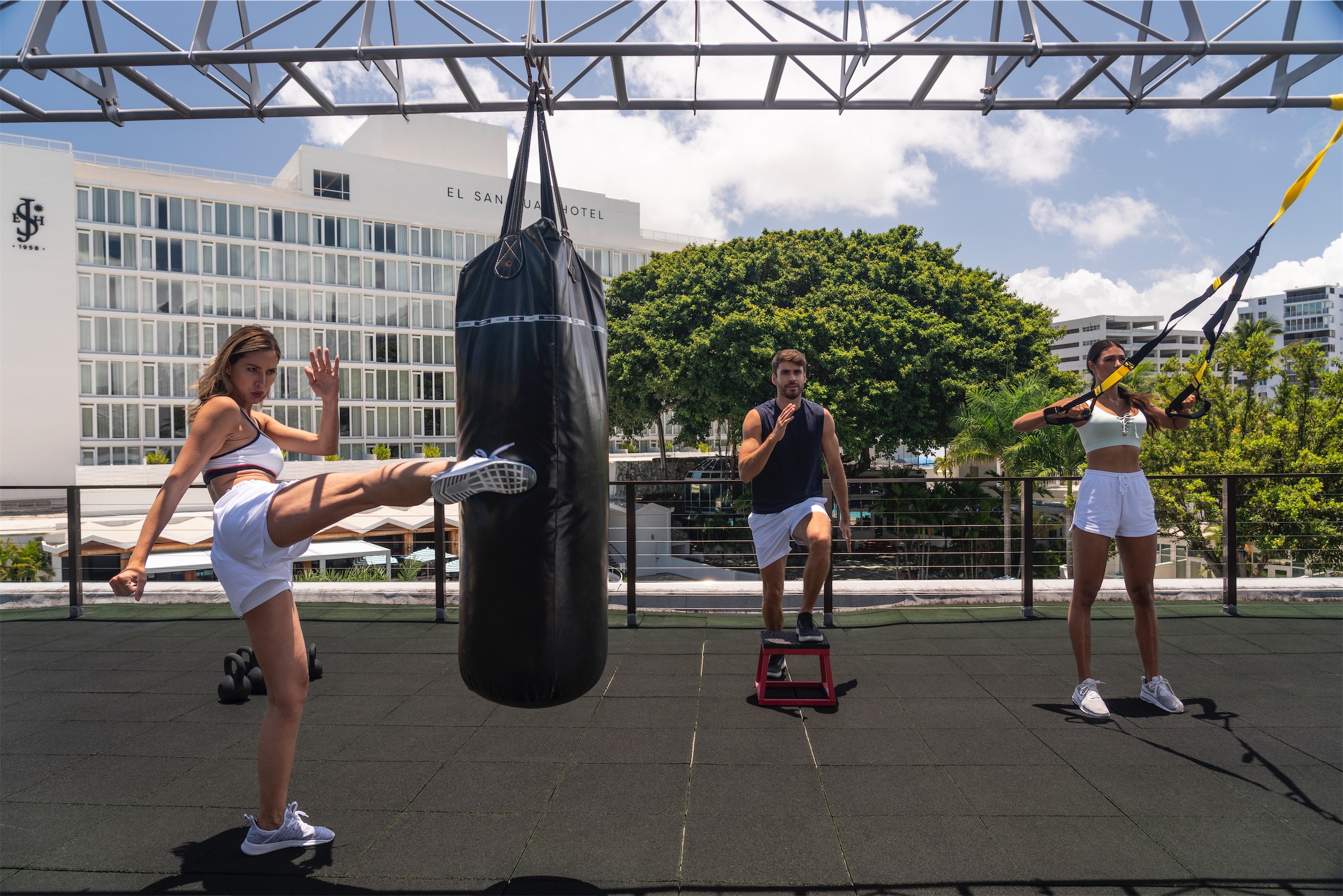 group of people in an outdoor fitness area